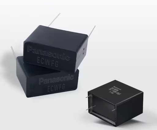 Three Panasonic ECWFG film capacitors. The capacitors are rectangular with visible metal leads and embossed product markings.