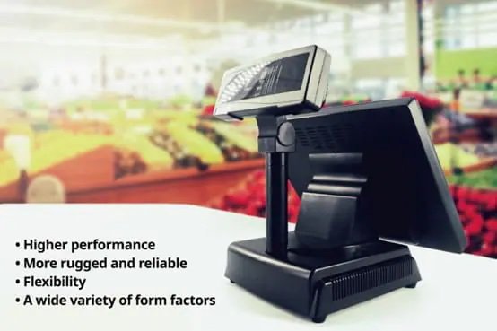 A sleek point of sale (POS) terminal is prominently displayed on a checkout counter in a brightly lit grocery or supermarket setting. The background is softly blurred, highlighting fresh produce and store shelves. On the left, overlay text lists features such as higher performance, rugged reliability, flexibility, and a wide variety of form factors.