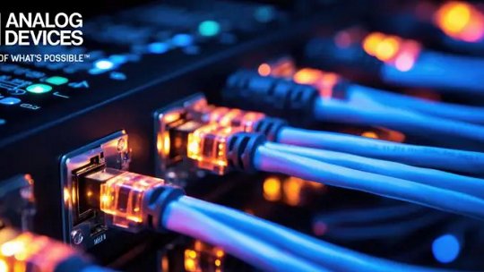 Une vue rapprochée de plusieurs câbles réseau branchés à un appareil, avec des connecteurs illuminés créant une atmosphère vibrante et haute technologie. Le logo Analog Devices et la phrase « AHEAD OF WHAT'S POSSIBLE » sont clairement visibles dans le coin supérieur gauche. La scène présente un arrière-plan sombre avec un éclairage bleu et orange, mettant en valeur le cadre technologique moderne.