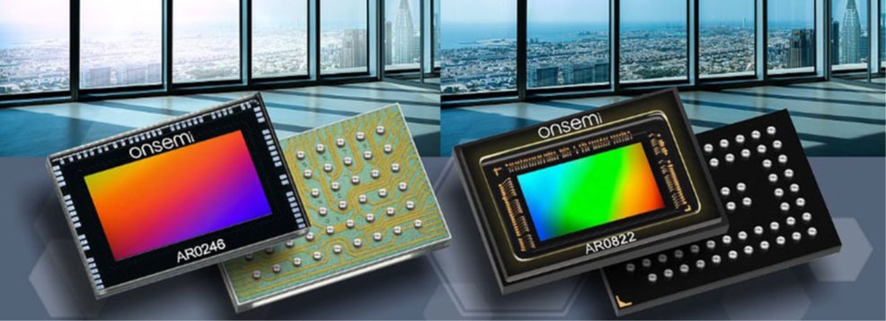 Two Onsemi image sensor modules are shown against a bright cityscape viewed through large windows. The left sensor is labeled AR0246 and features a colorful gradient on its surface with a detailed underside of solder bumps. The right sensor is labeled AR0822 and is paired with a black component featuring an array of white contact points. The overall composition emphasizes advanced imaging technology and modern electronic components.