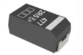 A close-up view of a black surface mount electronic component is shown, featuring white printed numbers and symbols on its top surface.