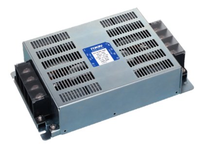 Rectangular metallic industrial power supply unit is shown isolated on a white background. The device features multiple ventilation slots on the top cover and dark terminal blocks on both ends. A blue and white specification label is centered on the top surface, indicating technical details that are not fully legible. The overall appearance suggests a robust component designed for electrical or electronic systems.