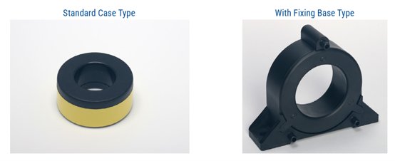 Image shows two circular industrial components side by side. The left item is a standard case type ring with a black top and yellow band. The right item is a larger ring component with a fixing base type mount and support structure. Blue text labels above each component read "Standard Case Type" and "With Fixing Base Type". The background is clean and light, emphasizing the mechanical parts.