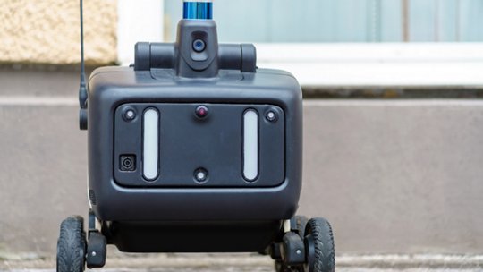 Illustration of an Advanced Driver Assistance System (ADAS) around a top-view car. 