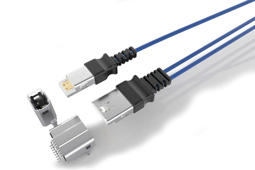 Image of two blue USB data cables with black strain reliefs on a white background. One cable features a standard USB Type-A connector, while the other shows a smaller connector resembling a micro or proprietary plug. Several detached metallic connector components are displayed beside the cables, highlighting internal parts and contacts. The clean, minimal setting emphasizes the technical details and modern design of the connectors.
