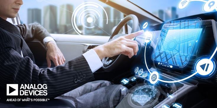 A person in formal attire interacts with a high-tech car dashboard featuring a digital touchscreen interface.