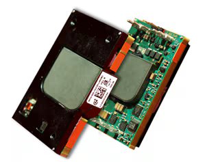 This image shows a detailed view of an electronic circuit board with a large processor chip. The board features various electronic components and connectors, with a visible QR code and numeric label.