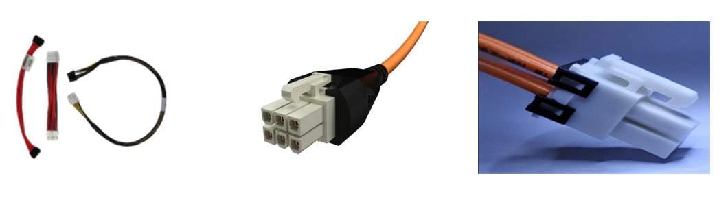 A collection of electrical connectors and wiring components, including cables and plugs.