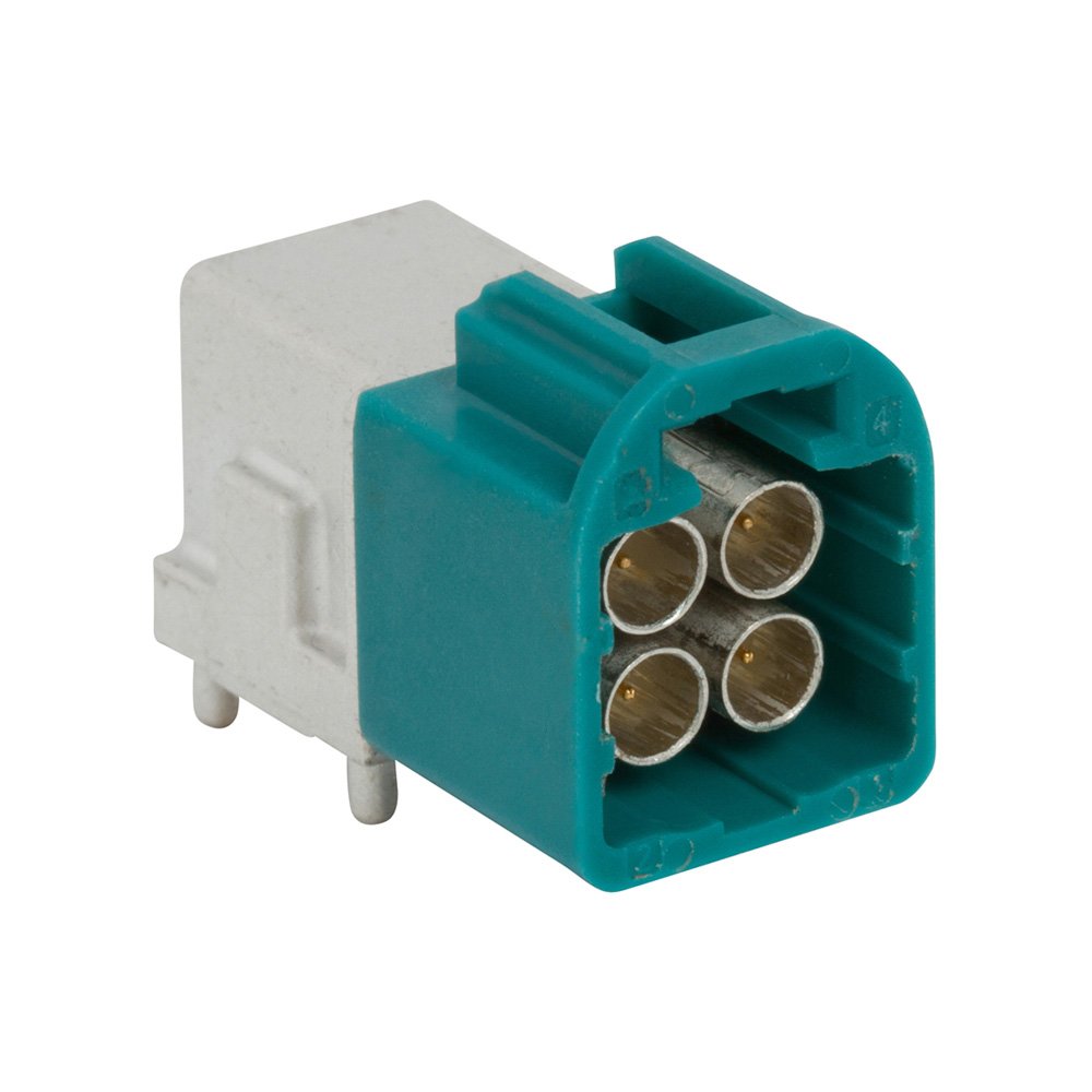 Image of a compact electrical connector featuring a teal plastic housing and a white rectangular base. 