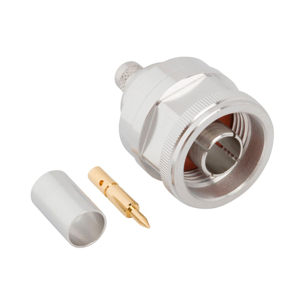 A metallic coaxial cable connector is shown disassembled on a white background. 