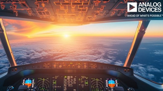 A modern airplane cockpit showcasing advanced control panels and illuminated displays during sunrise
