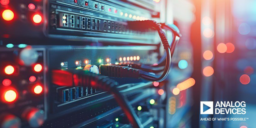 A close-up view of a server rack featuring connected cables and illuminated indicator lights