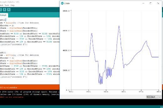 The image shows the Arduino IDE interface on the left, displaying code for handling encoder states and debouncing.