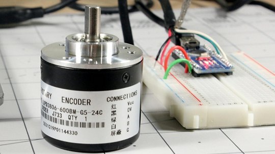 A rotary encoder labeled 'LPD3806-600BM-G5-24C' is prominently displayed on a gridded workspace.