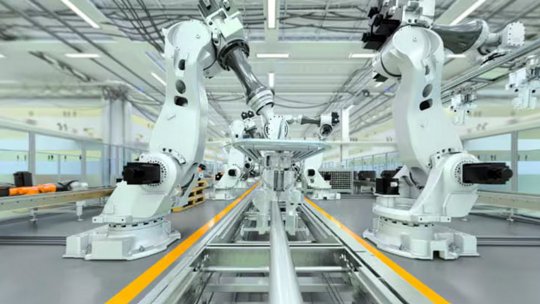 Robotic arms in modern manufacturing facility