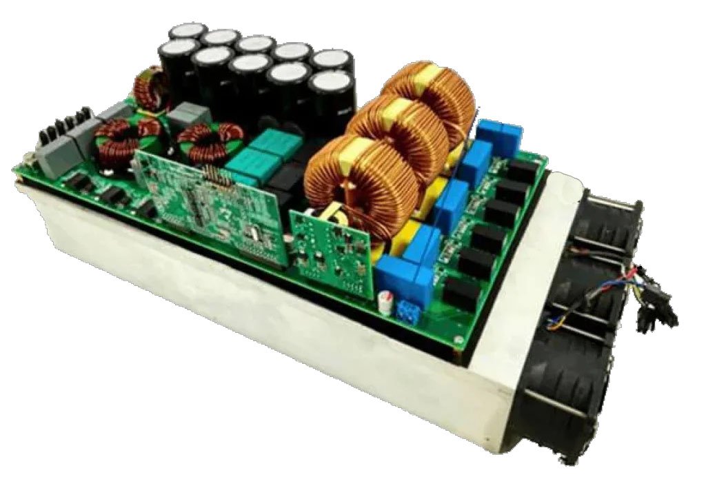 A detailed view of an electronic circuit board featuring copper coils, capacitors, and various components. 
