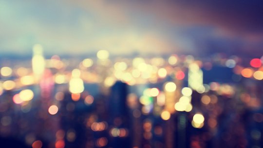 Blurred cityscape with vibrant night lights