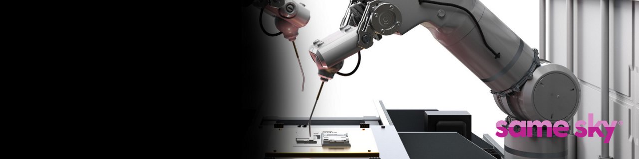 A pair of industrial robotic arms work over a flat assembly surface, positioning tools with precision.