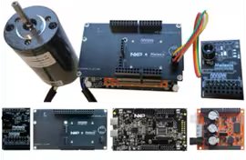 This image displays an NXP motor control development kit, including a motor, multiple circuit boards, and wiring. The main board is labeled 'NXP Freedom,' and other components are shown from various angles. Visible colored wires and electronic components highlight the technical setup.