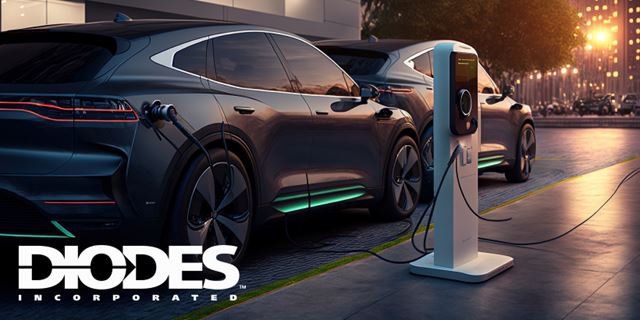Two sleek electric vehicles are parked and charging at a modern station during nighttime.