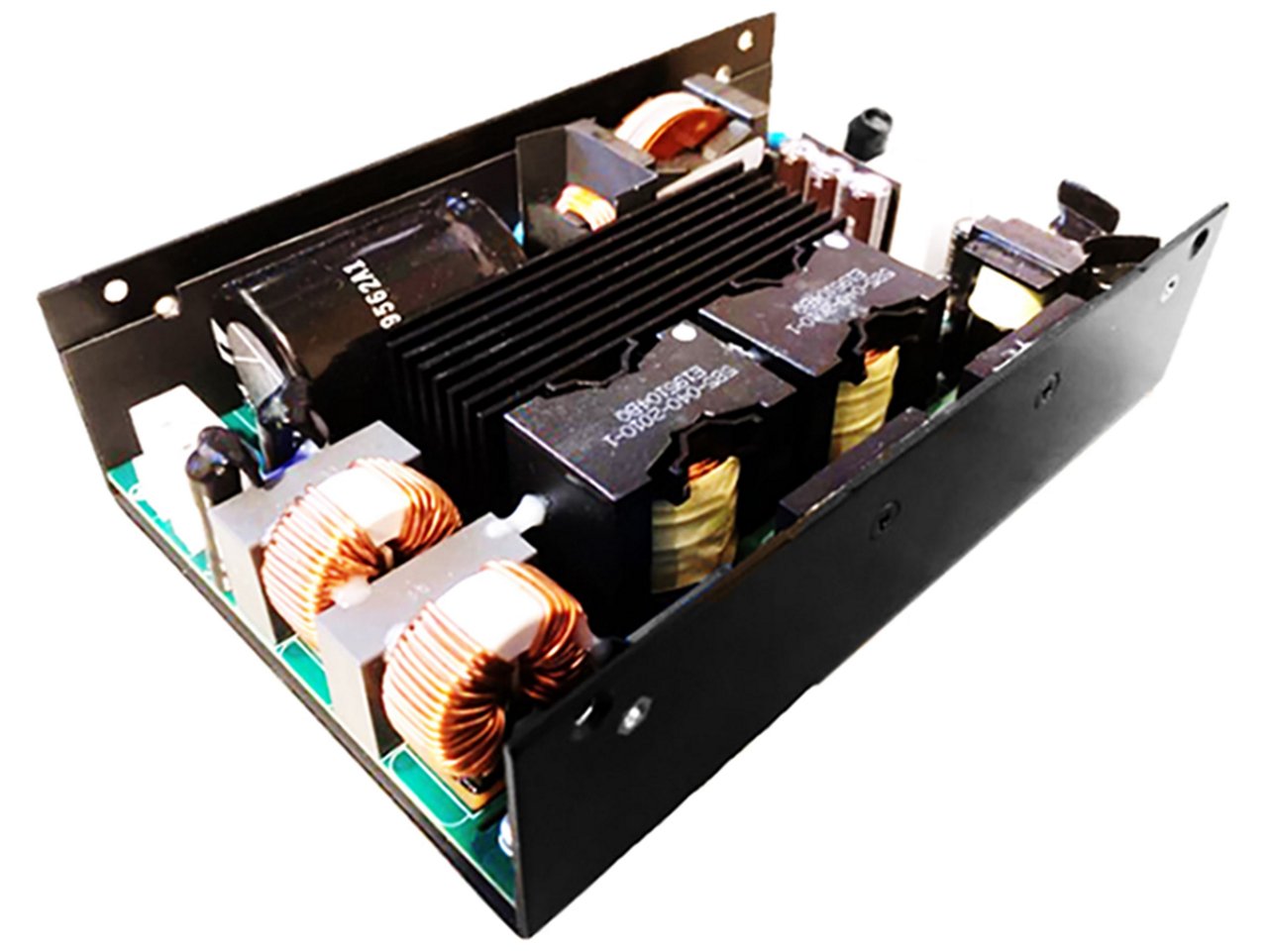 An open frame power supply unit, commonly used in industrial or electronic applications. The unit features visible copper coils, transformers, and heat sinks mounted on a circuit board.