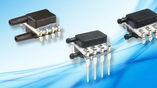 Three electronic pressure sensors are displayed against a blue gradient background
