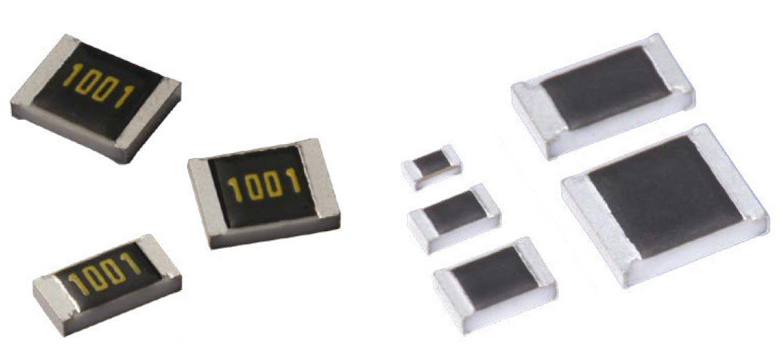 图像展示了几个不同尺寸的贴片电阻器，排列在纯白色背景上。