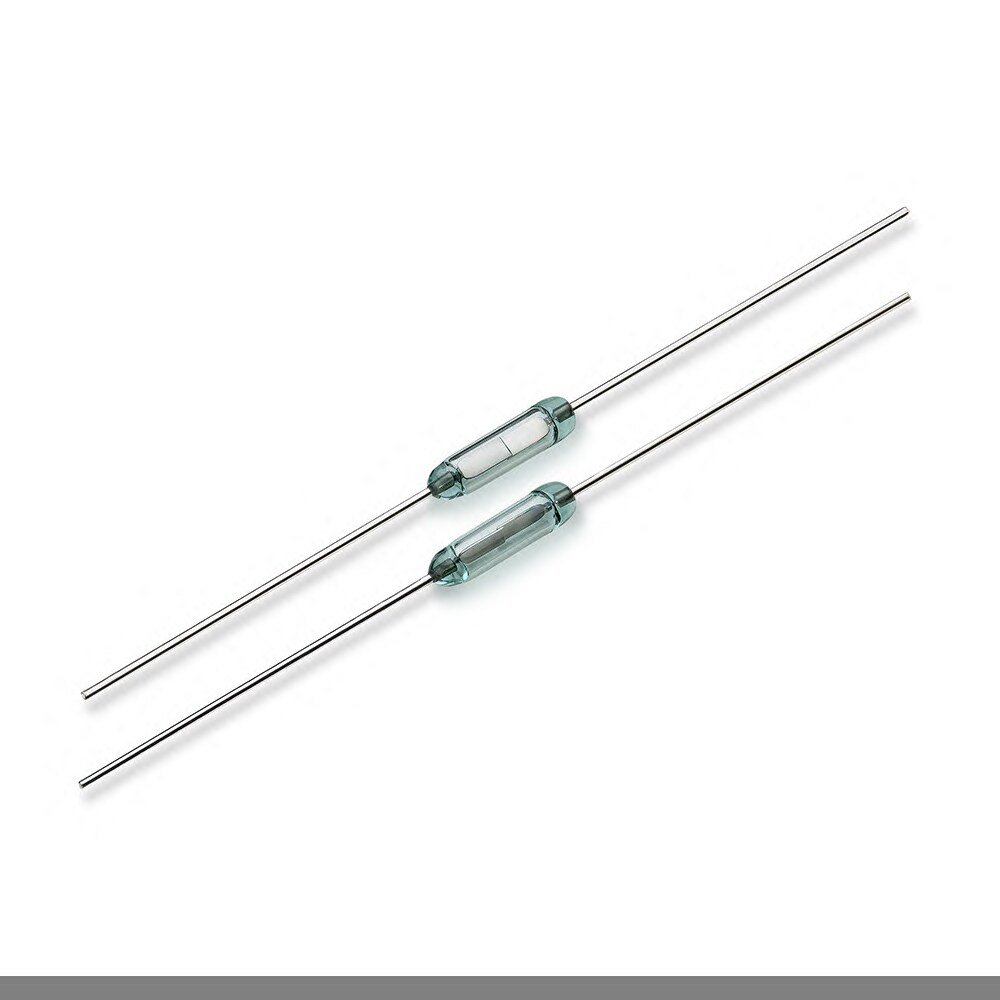 The image shows two glass reed switches, each featuring a cylindrical glass body with long, thin metal leads extending from both ends. The switches are positioned parallel to each other on a plain white background.