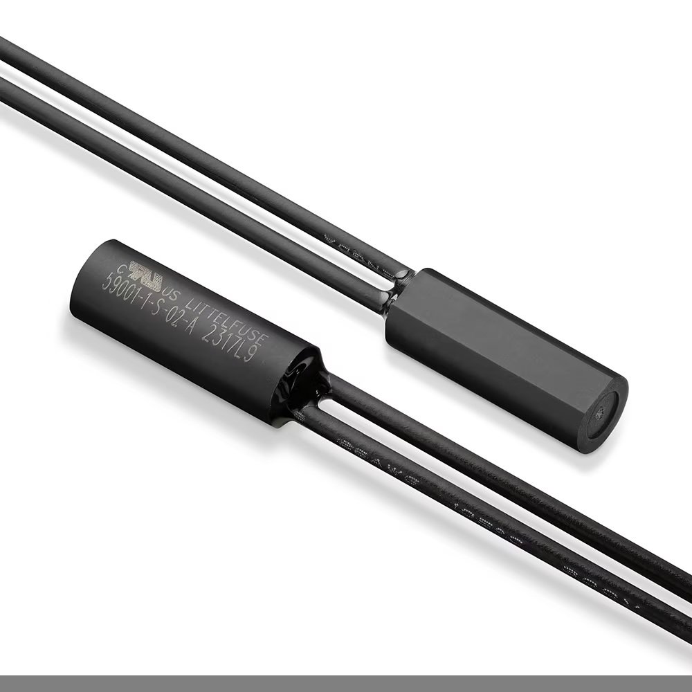 A close-up view of a cylindrical electronic sensor attached to a black cable. The sensor features visible engraved text, including the numbers '59001-15-02' and 'A31149'.