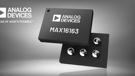 Close-up of the Analog Devices MAX16163 microchip, showcasing its sleek design and metallic components