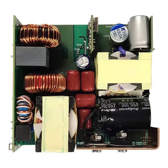 This image shows a close-up, top-down view internal components of an electronic power supply circuit board. Visible elements include copper coils, capacitors, transformers, and various electronic components mounted on a green PCB.