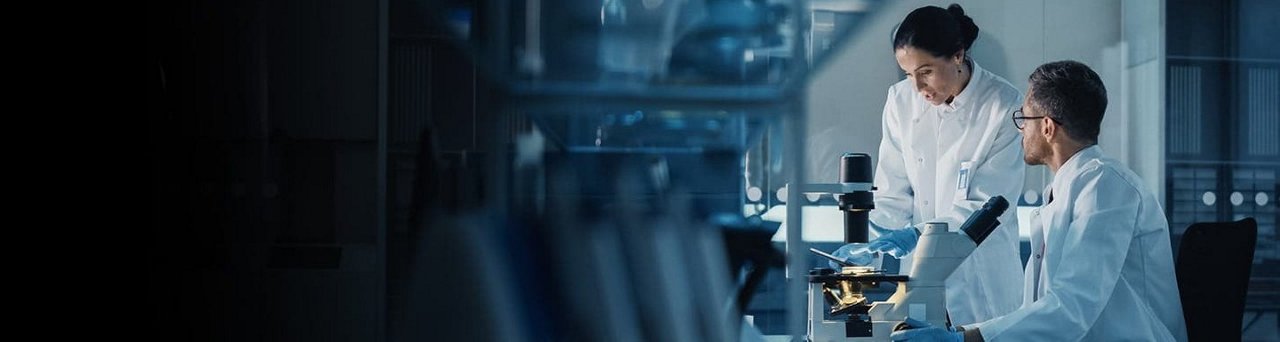 A detailed view of a grid of illuminated blue LED lights, arranged in a repetitive pattern