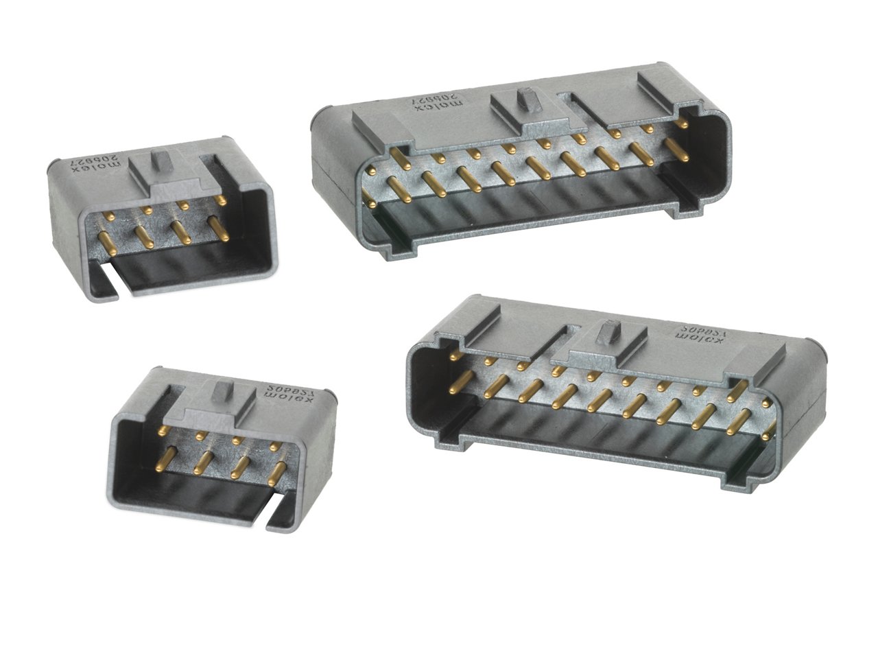 Image shows four rectangular multi-pin electrical connectors arranged on a white background. Each connector has a gray plastic housing with exposed gold-colored metal pins. The connectors vary in size, suggesting different pin counts or configurations. The clean, isolated presentation highlights the technical details and design of the components.