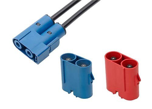 A set of electrical connectors featuring one blue connector with attached wires and two standalone connectors in red and blue.