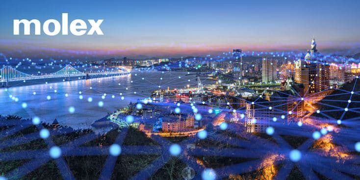 A vibrant cityscape at dusk featuring illuminated buildings and a bridge, overlaid with a digital network visualization.