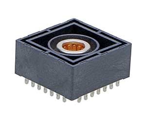 A small electronic sensor featuring a square design with visible pin connectors on the base. The central component includes a metallic circular element surrounded by a black casing. Ideal for integration into electronic devices or systems requiring precise sensing capabilities.