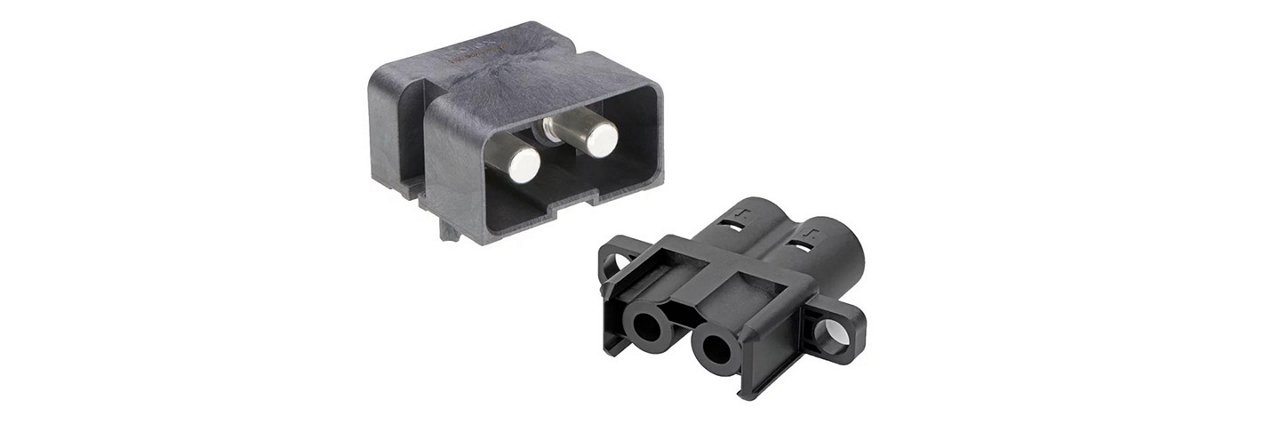Two black electrical connector components are displayed against a white background. 
