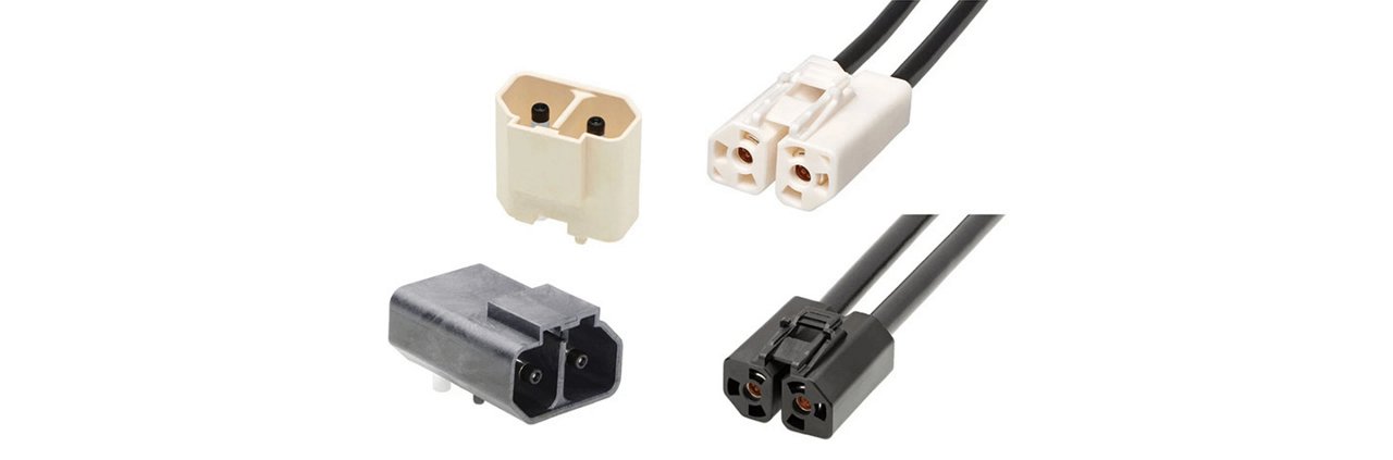 A collection of electrical connectors featuring different designs and colors, including black and beige. 