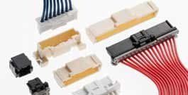 Un blocco connettore elettrico modulare composto da cinque sezioni distinte nei colori blu, grigio, nero e rosa.