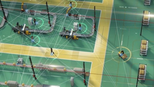 A high-tech factory floor showcasing automated machinery and workers interacting with advanced systems