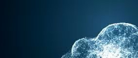 Digital illustration of a cloud made up of glowing blue particles on a dark background, symbolizing cloud computing and data connectivity.