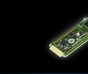 Green printed circuit board with ON Semiconductor logo and multiple electronic components on a black background.