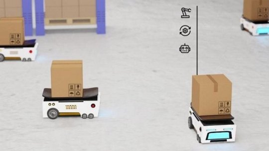 Small robotic vehicles are shown carrying cardboard boxes in a warehouse setting