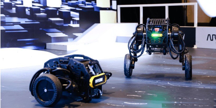 Two advanced robotic devices are displayed in a futuristic setting, featuring sleek designs and dynamic mobility