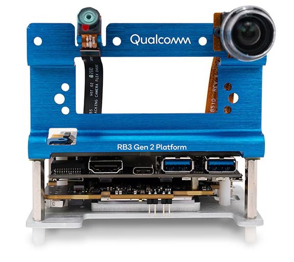 A Qualcomm RB3 Gen 2 Platform, a development board featuring multiple camera modules. The board includes HDMI, USB, and other interface ports, with attached camera sensors for vision applications. 
