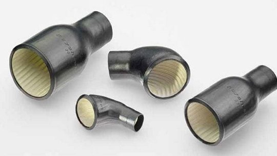 A set of black pipe fittings featuring various angled designs and sizes