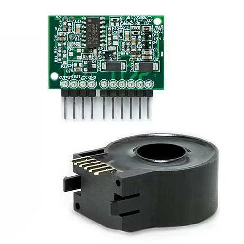 The image shows an electronic sensor module with visible circuit components and a separate circular current transducer. The sensor module features multiple pins for connectivity and detailed printed circuitry. The current transducer has a round opening, likely for wire or cable insertion, and several gold-plated contacts.