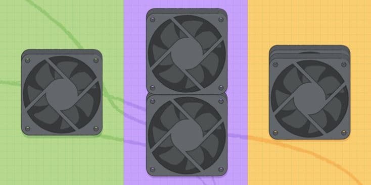 Three black computer cooling fans sit against a colorful green, purple, and orange grid background