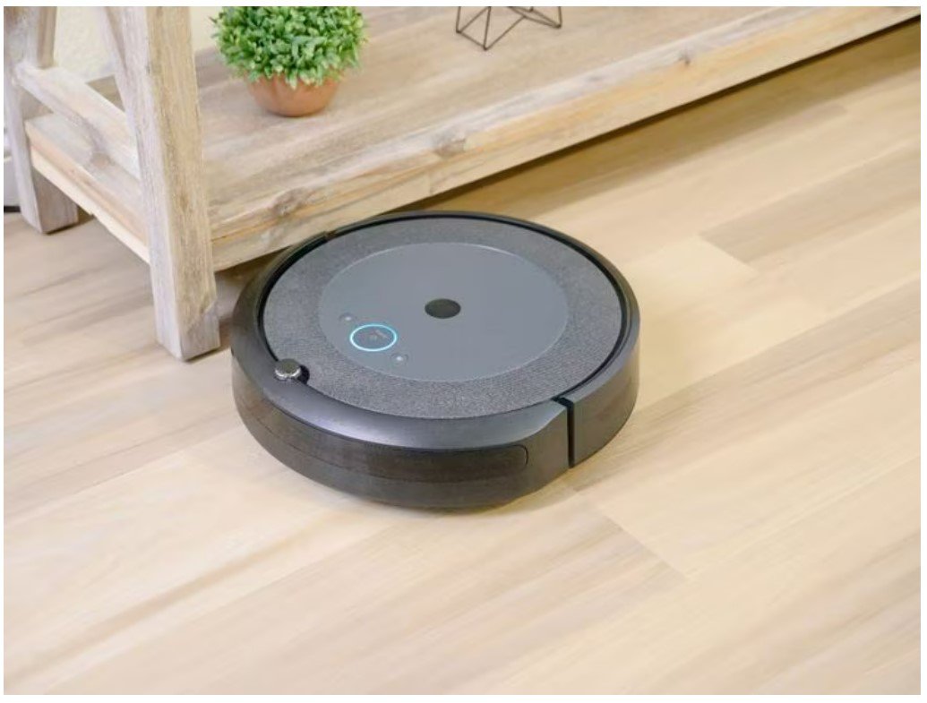 Image of robotic vacuum cleaning hardwood floor
