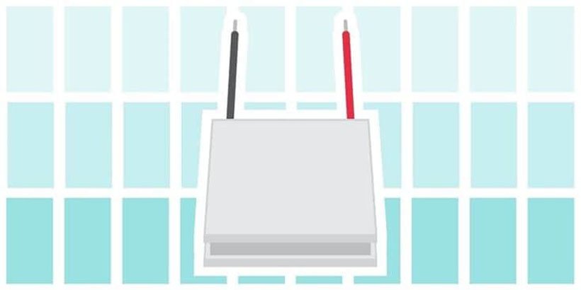 Diagram of a heat sink with attached black and red wires, set against a light teal grid background.